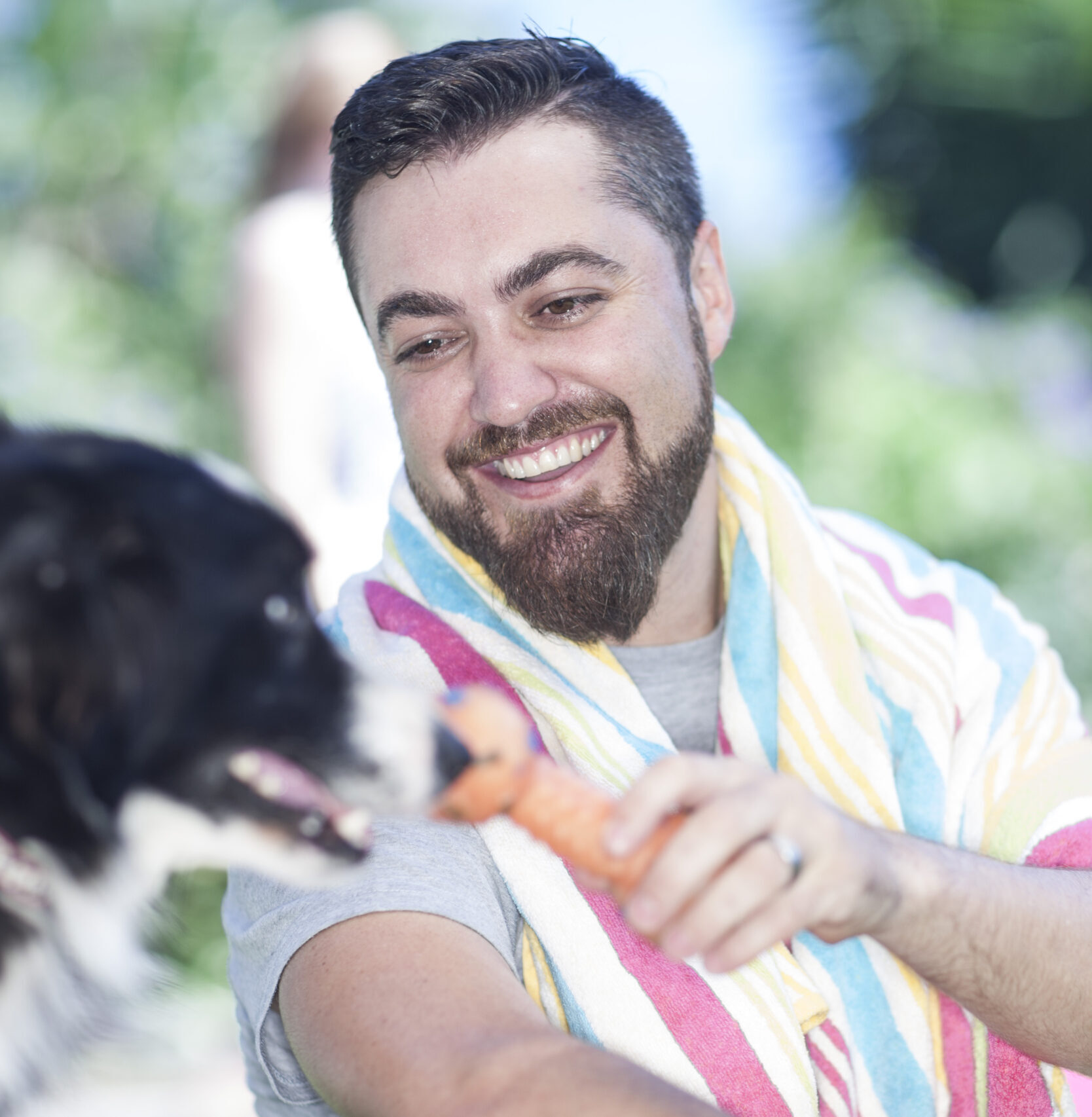 man playing with pet dog in garden 2024 06 17 22 02 12 utc scaled e1726700664571